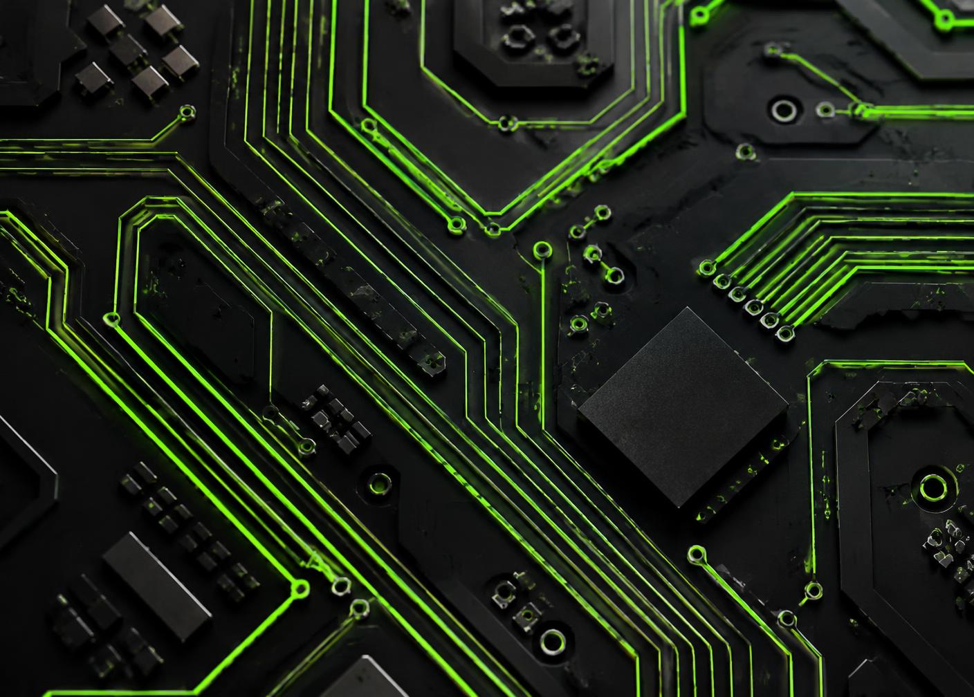Close-up of a circuit board with illuminated green traces